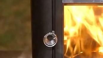 cheminee poele sauna mecanisme ouverture porte bois flamme chaleur detente harvia touschalets